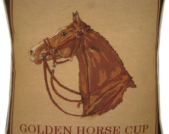 May include: A brown horse head with a bridle, against a beige background, with the text "GOLDEN HORSE CUP" at the bottom.