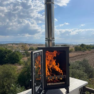 camping wood burning stove, caravan stove, campervan stove, outdoor stove, tent stove, tiny house stove, stove