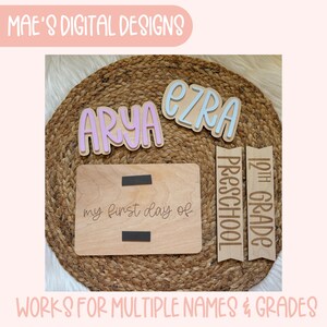 May include: Wooden sign with the text "my first day of" and two blank spaces for names or grades.  The sign is surrounded by other wooden signs with the names "Arya" and "Ezra" and the grades "12th Grade" and "Preschool".