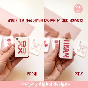 May include: A white and red card with "XO XO" and the number 4 on the front, and the name "Wyatt" on the back. The card is held in a hand. Other cards with hearts and lips are in the background. Text reads "make it a two sided design to add names!"