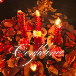 May include: A spiritual arrangement featuring three lit red candles surrounded by rose petals and slices of fruit. A golden statue is in the background. The word "Confidence" is written in a cursive font across the image.