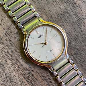 Seiko Dolce gold two tone classic quartz dress watch