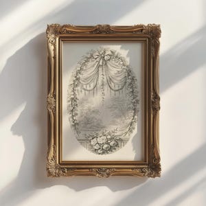 May include: A framed vintage print with an oval landscape scene, featuring a floral garland and draped ribbons. The ornate gold frame adds a classic touch to the artwork, creating a timeless aesthetic. The print is displayed against a white wall.