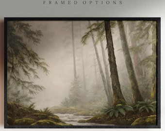 May include: Framed art print of a misty forest scene. Tall trees with green foliage line a river, with ferns and moss in the foreground. The text "AVAILABLE IN PHYSICAL PRINTS & FRAMED OPTIONS" is at the top, and "WEST & WILD" is at the bottom.