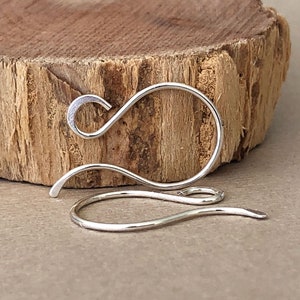 May include: Silver earring hooks, also known as French hooks, are a popular choice for jewelry making. These hooks are made of high-quality silver and are perfect for adding a touch of elegance to any design.