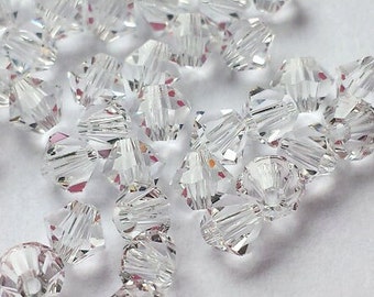 50 piece lot 5301 Swarovski 4mm Clear Crystal bicone beads