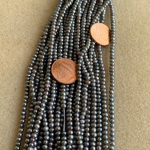 Fresh Water Pearls Grey Buttons 3x4mm a 16 inch strand