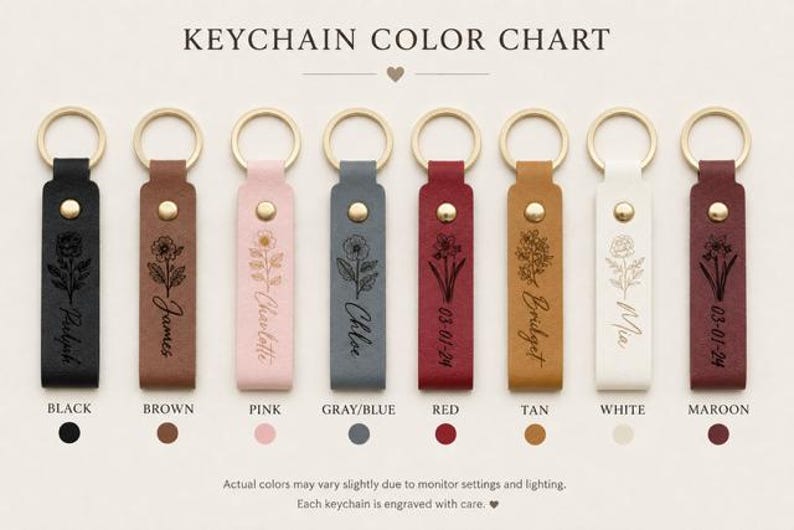 May include: A keychain color chart displaying eight rectangular leather keychains in black, brown, pink, gray-blue, red, tan, white, and maroon. Each features a gold metal ring, a gold rivet, and a unique floral engraving with a name or date.
