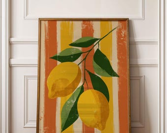 Op de afbeelding: Een ingelijste kunstdruk met een citroentak met drie gele citroenen en groene bladeren. De achtergrond heeft verticale strepen in oranje en geel. Het kunstwerk wordt op een houten vloer getoond.