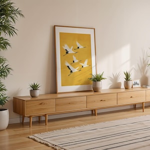 Golden yellow and white crane print, ideal for living rooms, offices, and meditation spaces.