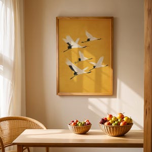 Minimalist crane wall art featuring graceful birds in flight for sophisticated home decor.