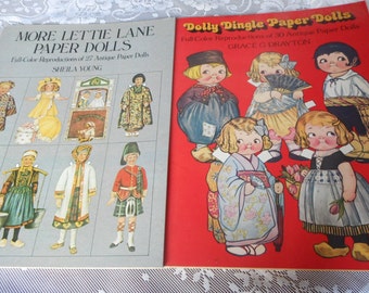 2 VINTAGE Around the World Dolly Dingle & Antique Fashions Paper Dolls Paper Emphemera Soft Cover Books Interchangable Clothes Collectible