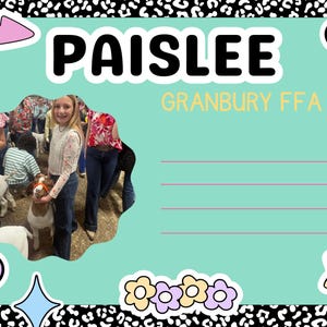 May include: A teal-colored card with the name "Paislee" in large, bold letters. The card features a photo of a girl with goats, and the text "Granbury FFA". Decorative elements include flowers, a heart, a star, and a rainbow.