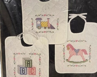 1985 Janlyn Printed Cross Stitch Nursey Time Bibs #69-14 NEW