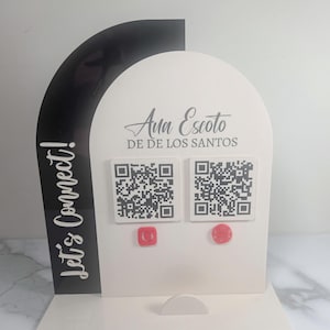Modern acrylic booth display with logo panel, QR payment sign, and business card holder for small business setup