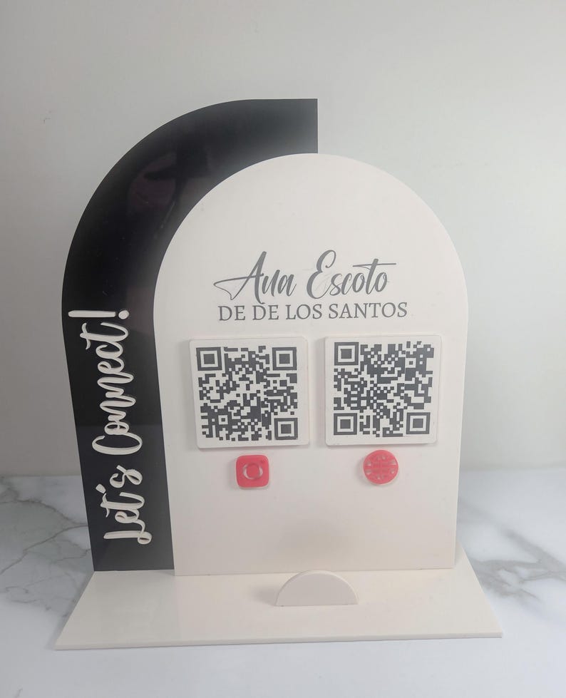 Modern acrylic booth display with logo panel, QR payment sign, and business card holder for small business setup