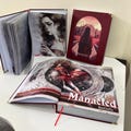 Full color Manacled Hardcover Books . Manacled hardcover new design, colorful content and images product logo