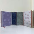 the cadence of part-time poets Hardcover set . set of 4 books . personalized hardcover product logo
