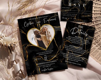 May include: Black and gold wedding invitation with a photo of a couple in a heart-shaped frame. The invitation includes the couple's names, wedding date, time, and location. The text "RSVP" is on a separate card with a black and gold marble design.
