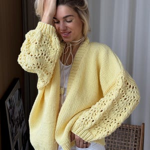 Elegant Yellow Merino Wool Cropped Cardigan with Lantern Sleeves - Minimalist Chic Knitwear for Women