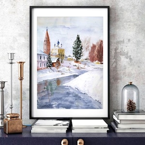 May include: A watercolor painting of a snowy winter scene with a church building, a river, and trees. The church has a tall, red steeple and a yellow roof. The river is frozen over and covered in snow. The trees are bare and covered in snow.
