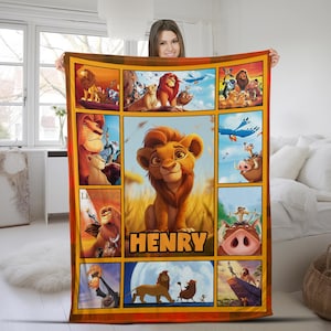May include: A colorful fleece blanket with a collage of images from the Lion King movie. The blanket features Simba, Mufasa, Pumbaa, and other characters. The name "HENRY" is printed in a yellow banner at the bottom of the blanket.