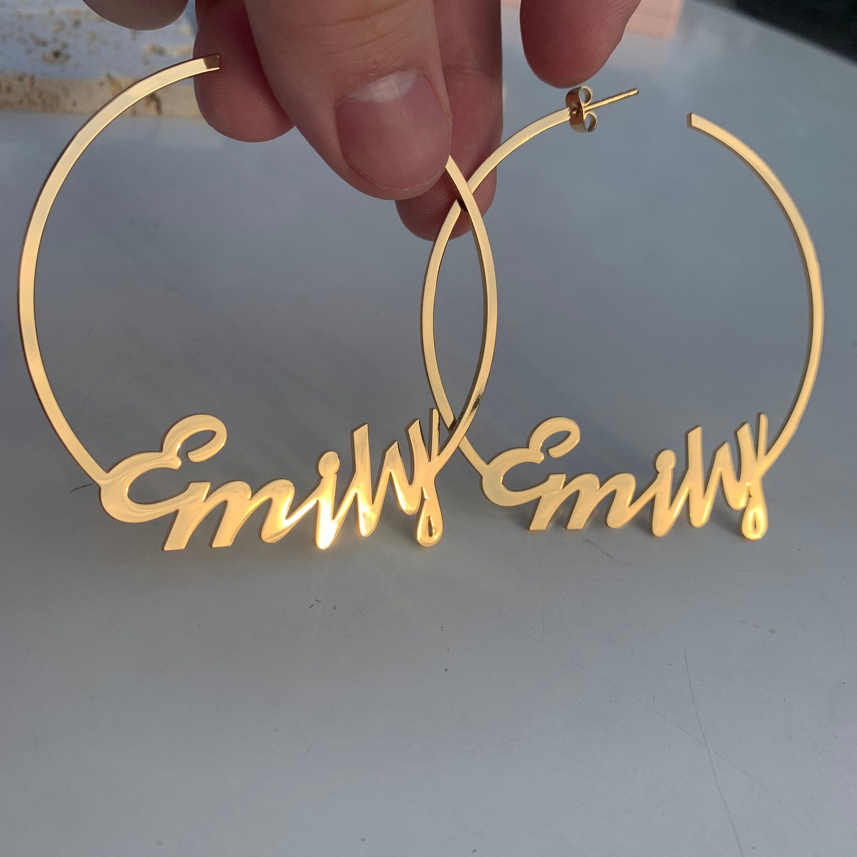 Gold hoop name earrings best sale