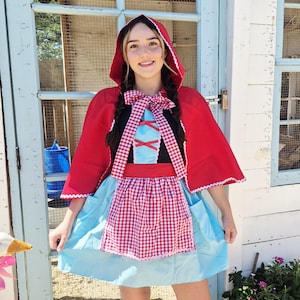 little red riding hood blue dress Little Red Riding Hood in Into the Woods Costume Guide