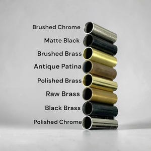 May include: A vertical arrangement of metal tubes in various finishes, including brushed chrome, matte black, brushed brass, antique patina, polished brass, raw brass, black brass, and polished chrome. Text labels each finish.