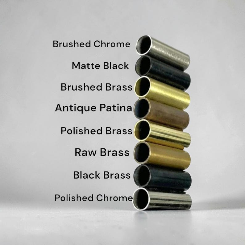 May include: A vertical arrangement of metal tubes in various finishes, including brushed chrome, matte black, brushed brass, antique patina, polished brass, raw brass, black brass, and polished chrome. Text labels each finish.