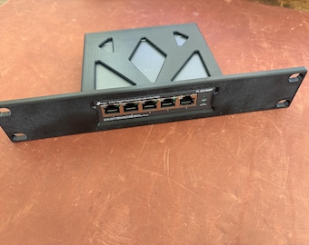 TP-LINK TL-SG1005P 10" rackmount