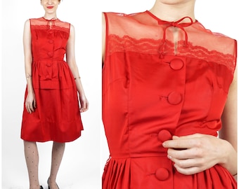 Vestido de fiesta vintage rojo rubí sin mangas de los años 50/60 con escote ilusión y lazo de Vicky Vaughn (talla XS/pequeña)