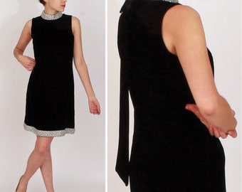 Vintage 1960s Sleeveless Black Velvet Mod Shift Dress with Sparkly Silver Trim and Long Back Bow | Small