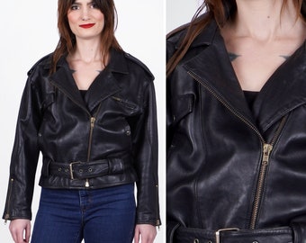 May include: A black leather motorcycle jacket with a zipper closure, a belt at the waist, and multiple pockets.