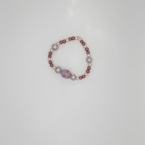 Handmade Beaded Bracelet with Purple and Pearl Accents