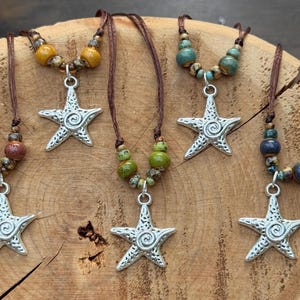 silver swirly star ceramic necklace 𖤓 bohemian jewelry  • handmade by me