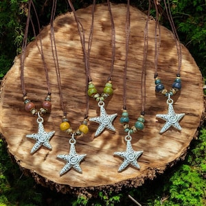 silver swirly star ceramic necklace 𖤓 bohemian jewelry  • handmade earthy unisex christmas gift for relative or friend holiday present