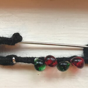 One Black Fiber Wrapped Antiqued Silver-plated 3-inch Kilt Pin with four handmade glass teardrops
