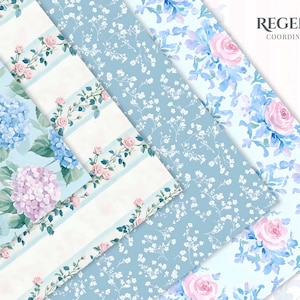 May include: A collection of patterned papers with floral designs. The patterns include blue and pink hydrangeas, pink roses with blue leaves, and white floral sprigs on a light blue background. The text "REGENCY COORDINATING" is in the upper right corner.