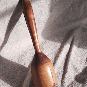 Antique wood potato masher or pounder.