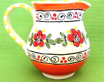 Orange and Red Pitcher