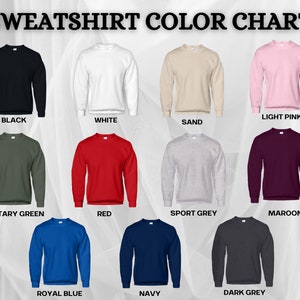 May include: Color chart showing 12 different sweatshirt colors. The colors are: black, white, sand, light pink, military green, red, sport grey, maroon, royal blue, navy, and dark grey.