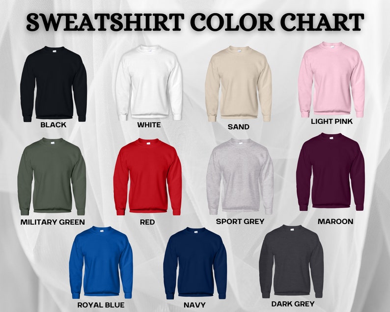 May include: Color chart showing 12 different sweatshirt colors. The colors are: black, white, sand, light pink, military green, red, sport grey, maroon, royal blue, navy, and dark grey.
