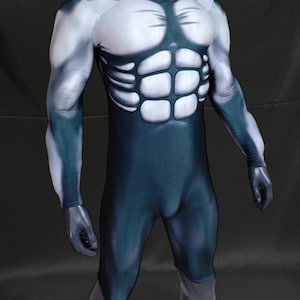 May include: A full-body bodysuit with a muscle-like design. The suit is primarily dark blue with white and light blue accents, creating the illusion of a muscular physique. The design includes details of the chest and arm muscles.