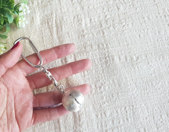 VINTAGE chiming tennis ball keyring