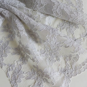 Dove grey corded lace fabric with scalloped edge. 51&quot; wide. Bridalwear fabric. Wedding dress lace. Light grey floral lace fabric.