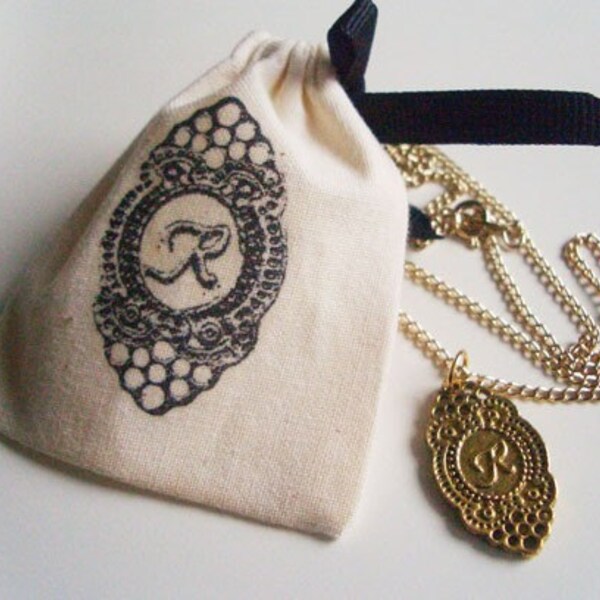 R - ornate initial necklace with matching pouch
