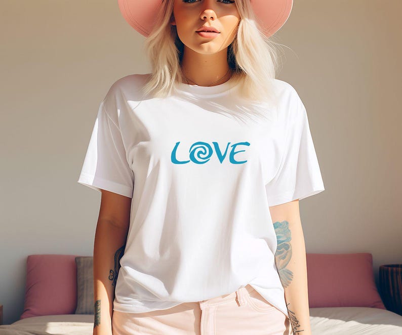 May include: White t-shirt with a blue graphic that says "LOVE" with a stylised swirl in the "O".