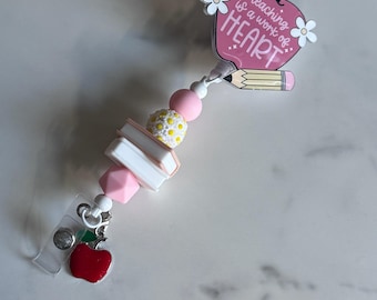 Teach is a Work of Heart Badge Reel Clip