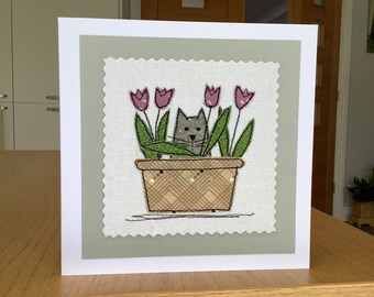 Sewn fabric cat amongst the flowers textile art greetings card.